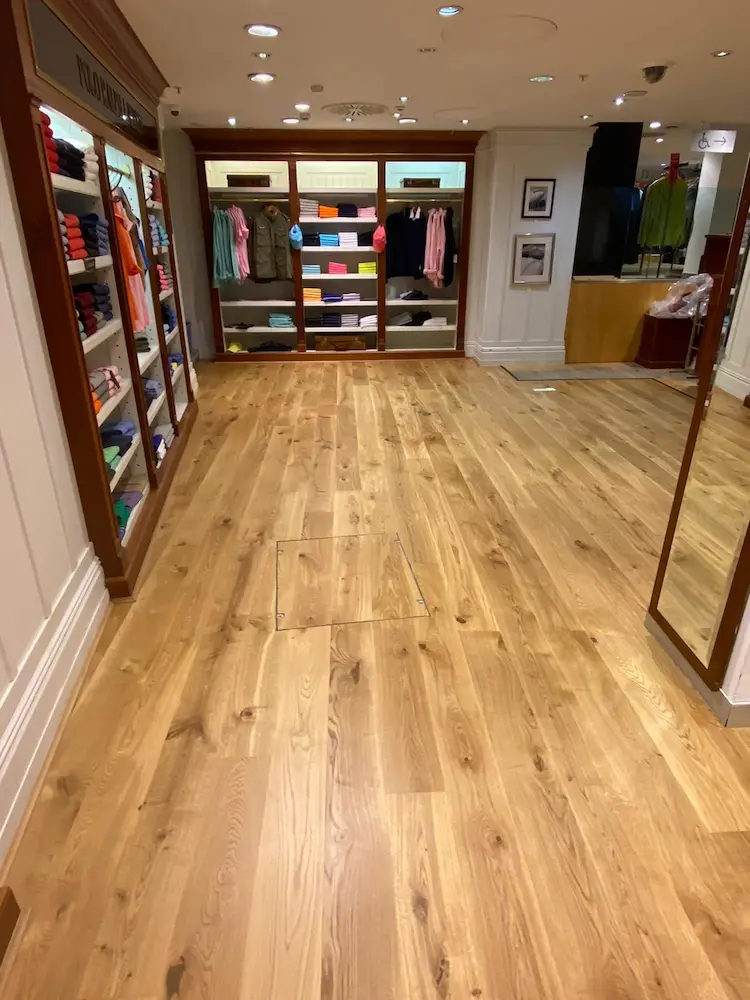 Retail wood floor restoration, Guilford School floor sanding